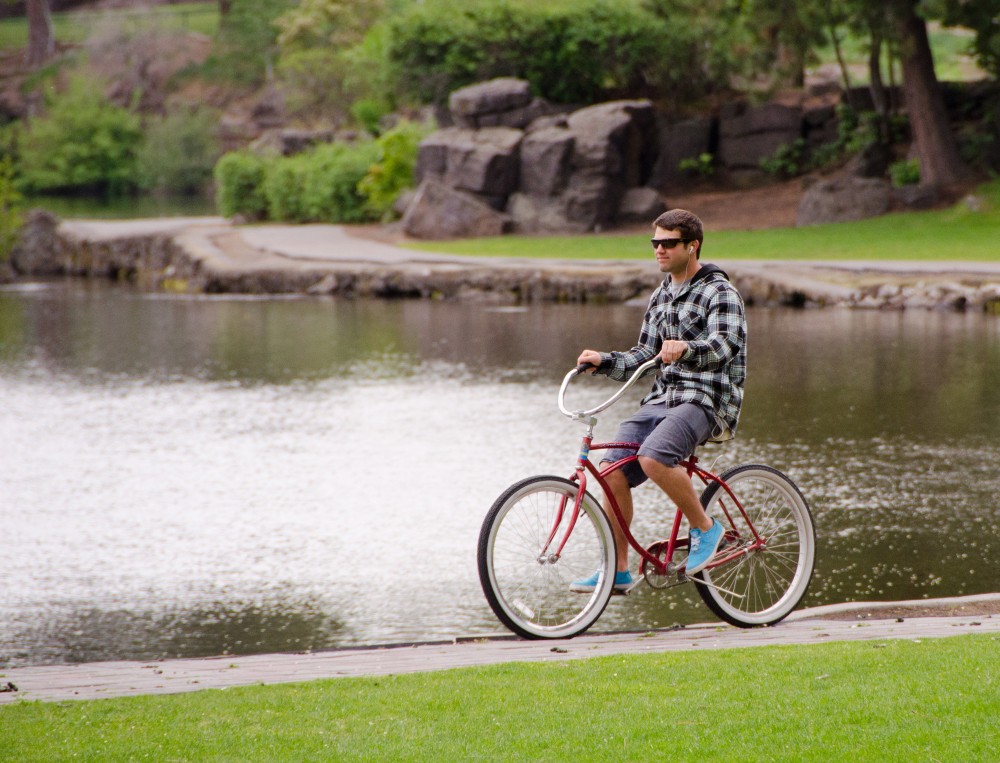 Man riding bike near Deschutes River, Bend Oregon